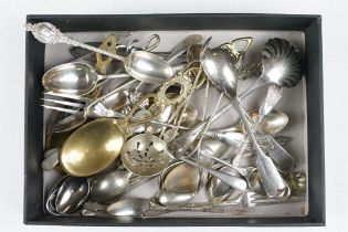 A small collection of silver and silver plated cutlery to include teaspoons, caddy spoon, sugar