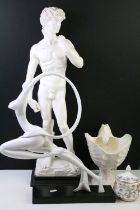 Composite figurine of Michelangelo's David raised on a black plinth base together with a Wedgwood