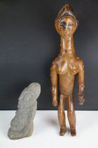 Carved African hardwood figure of a stylised female holding a bottle & vessel (approx 42cm tall),