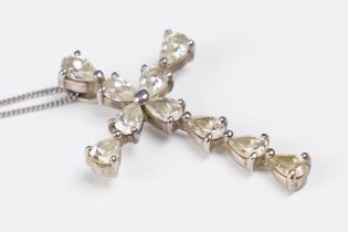 A 925 sterling silver cross pendant set with clear stones, cross measures approx 4cm in length,