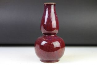 18th Century Chinese flambé / purple glazed double gourd vase, measures approx 24.5cm high. This lot