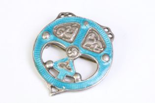 A fully hallmarked sterling silver and turquoise enamel Alexander Ritchie Iona brooch, of circular