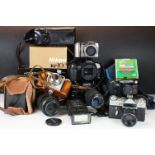 A collection of mixed photographic equipment to include Zenit and Chinon 35mm SLR cameras together