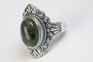 A 925 Sterling silver with labradorite centre cabochon ladies ring with decorative surround,