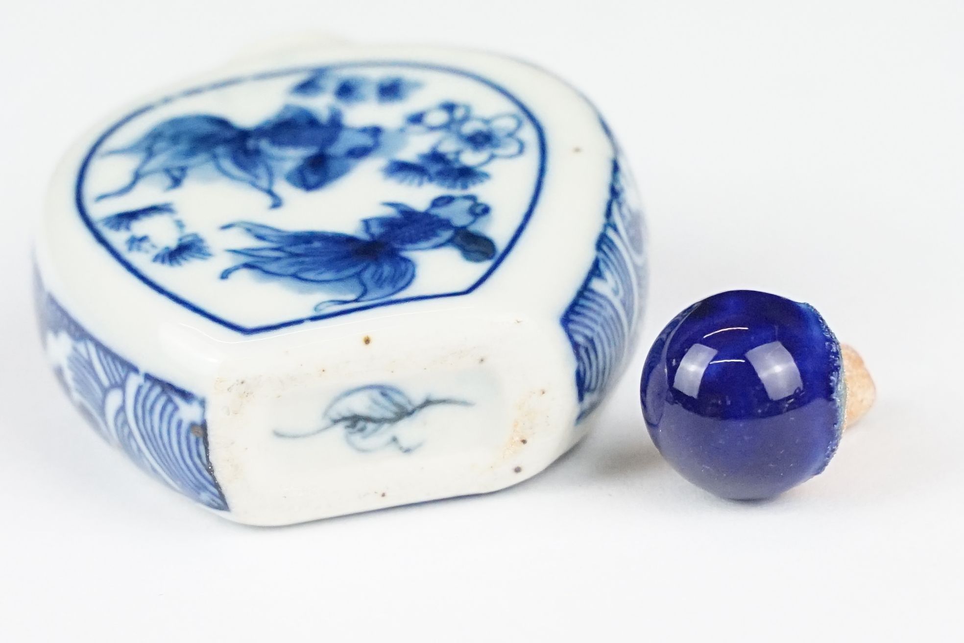 Two Chinese blue and white ceramic snuff bottles with traditional Chinese decoration. - Image 8 of 8