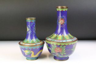 Two Chinese cloisonne vases of baluster form, with floral & foliate design on a cobalt blue