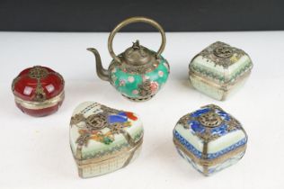 Four Chinese porcelain trinket boxes with white metal mounts depicting dragons, birds & butterflies,