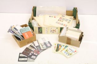 Collection of presentation pack stamps including 1970s and 1980s editions and some more recent