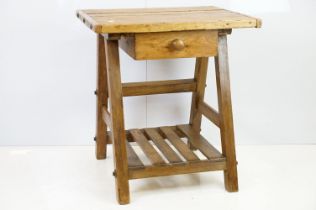 Early vintage pine work table with underslung drawer and pot shelf below, 81.5cm high x 75cm wide