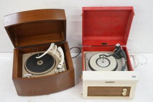 A mid 20th century Dansette red table top record player together with a wooden cased example