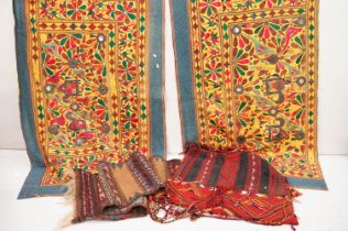 Collection of Indian and middle eastern textiles to include a pair of Indian embroidered curtains