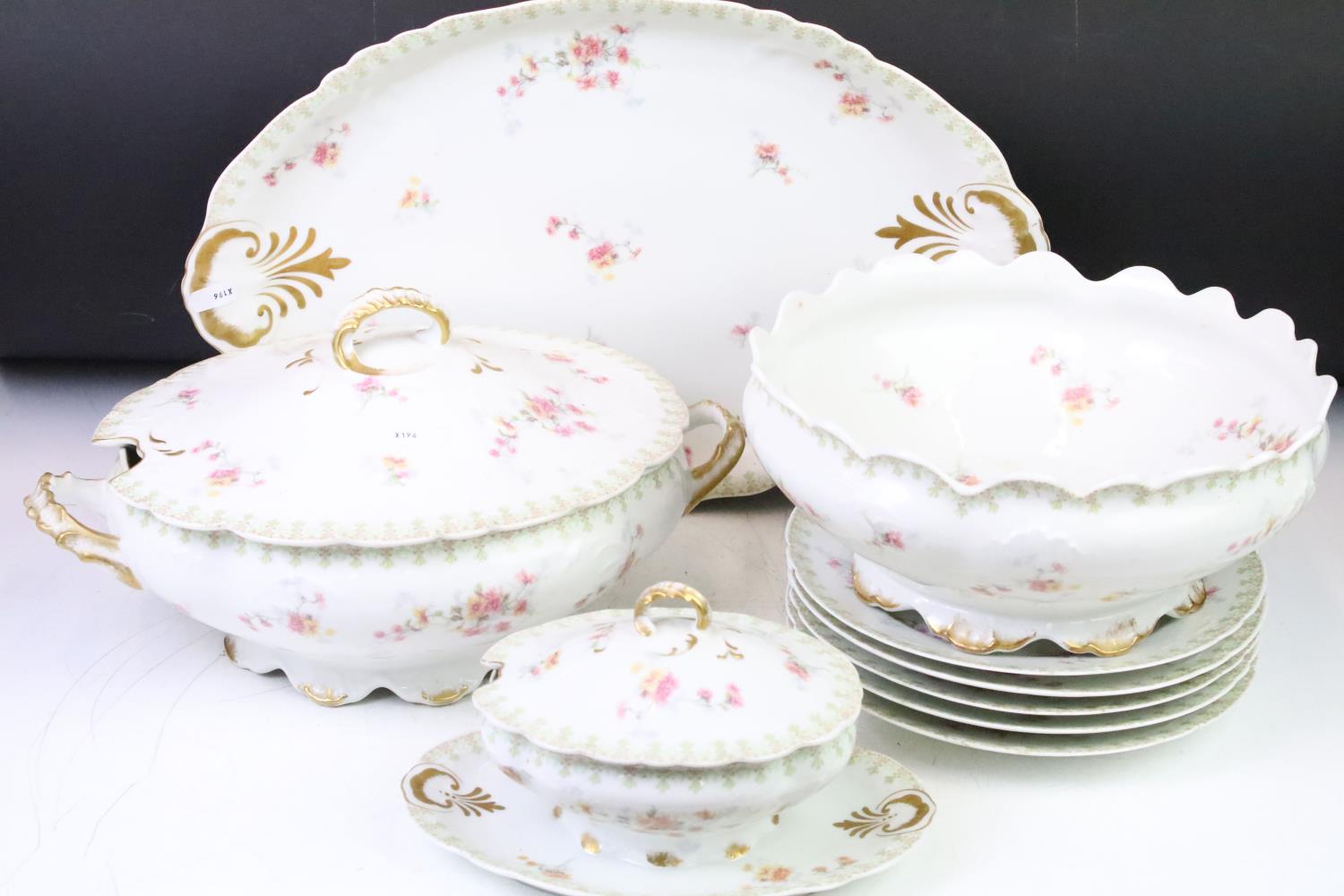 Limoges extensive dinner set to include approximately; two large lidded tureens, 1 oval platters,