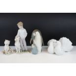 Four Lladro porcelain figures / figure groups to include 6902 My Loyal Friend, 1169 Couple of Doves,