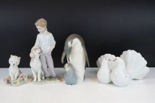 Four Lladro porcelain figures / figure groups to include 6902 My Loyal Friend, 1169 Couple of Doves,