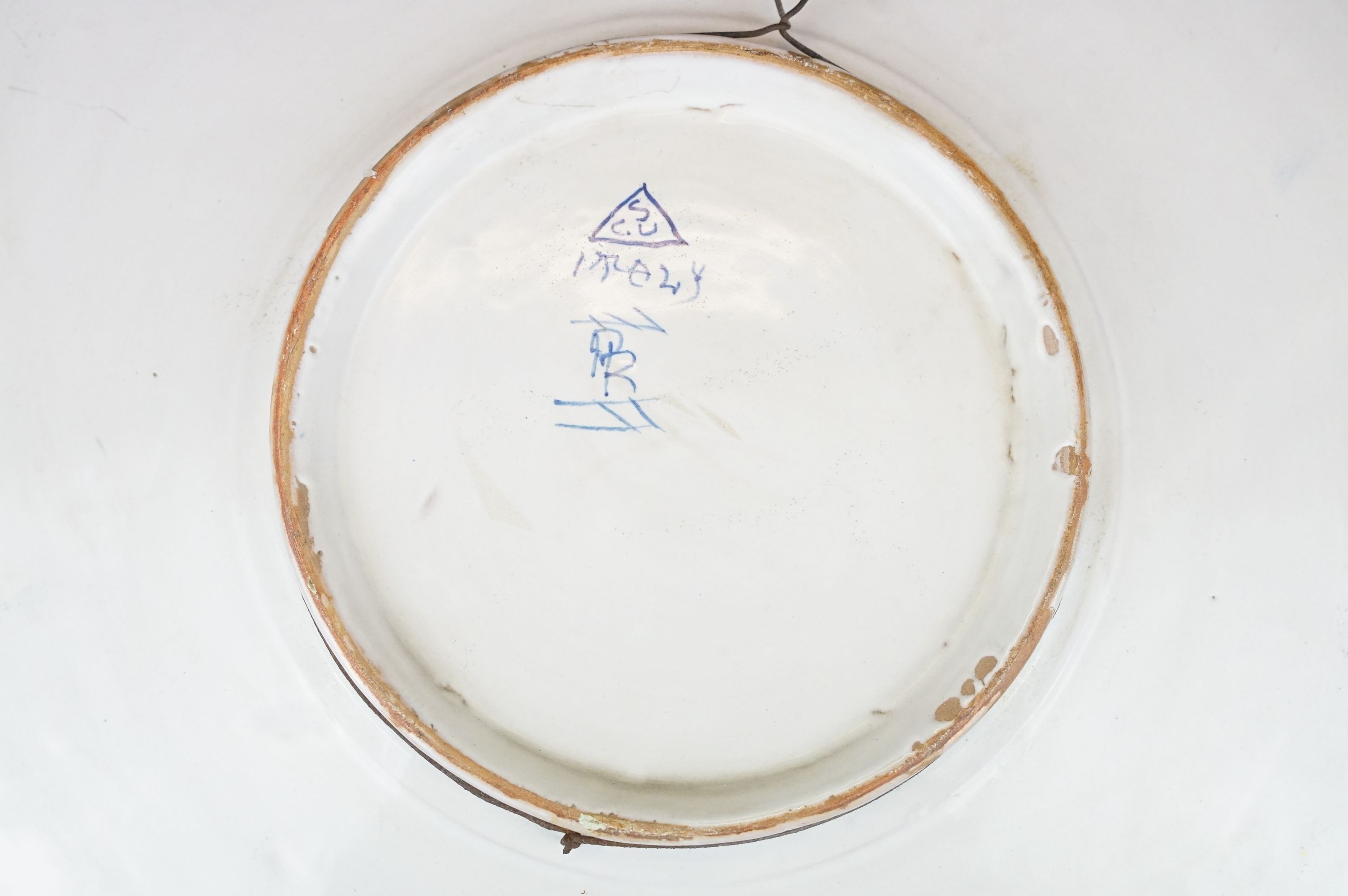 Two Italian faience wall plates, one depicting Roman figures with a volcano beyond, the other with a - Image 7 of 13