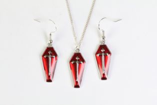 A ladies gothic earring and pendant set, coffin shaped pendant with red enamel and central cross