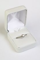 White gold three stone diamond ring