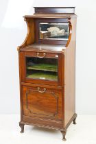 20th century mahogany music cabinet, with two cupboards below mirrored shelf area, 124cm high x 48cm