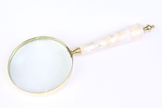Large brass and mother-of-pearl magnifying glass