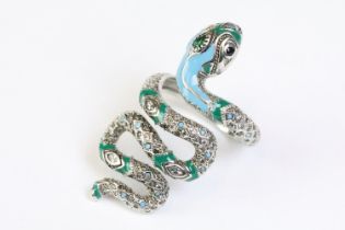 A 925 sterling silver ladies snake ring, the body of the snake decorated with gemstones and green