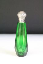 Faceted glass perfume bottle with stopper