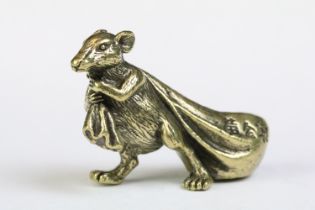 A Chinese ornamental Solid brass lucky fortune rat with character marks to bag, measures approx