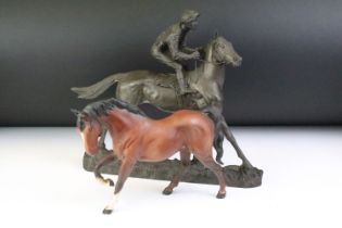 Resin model of a racehorse & jockey with indistinct mark to base (approx 29.5cm high), together with