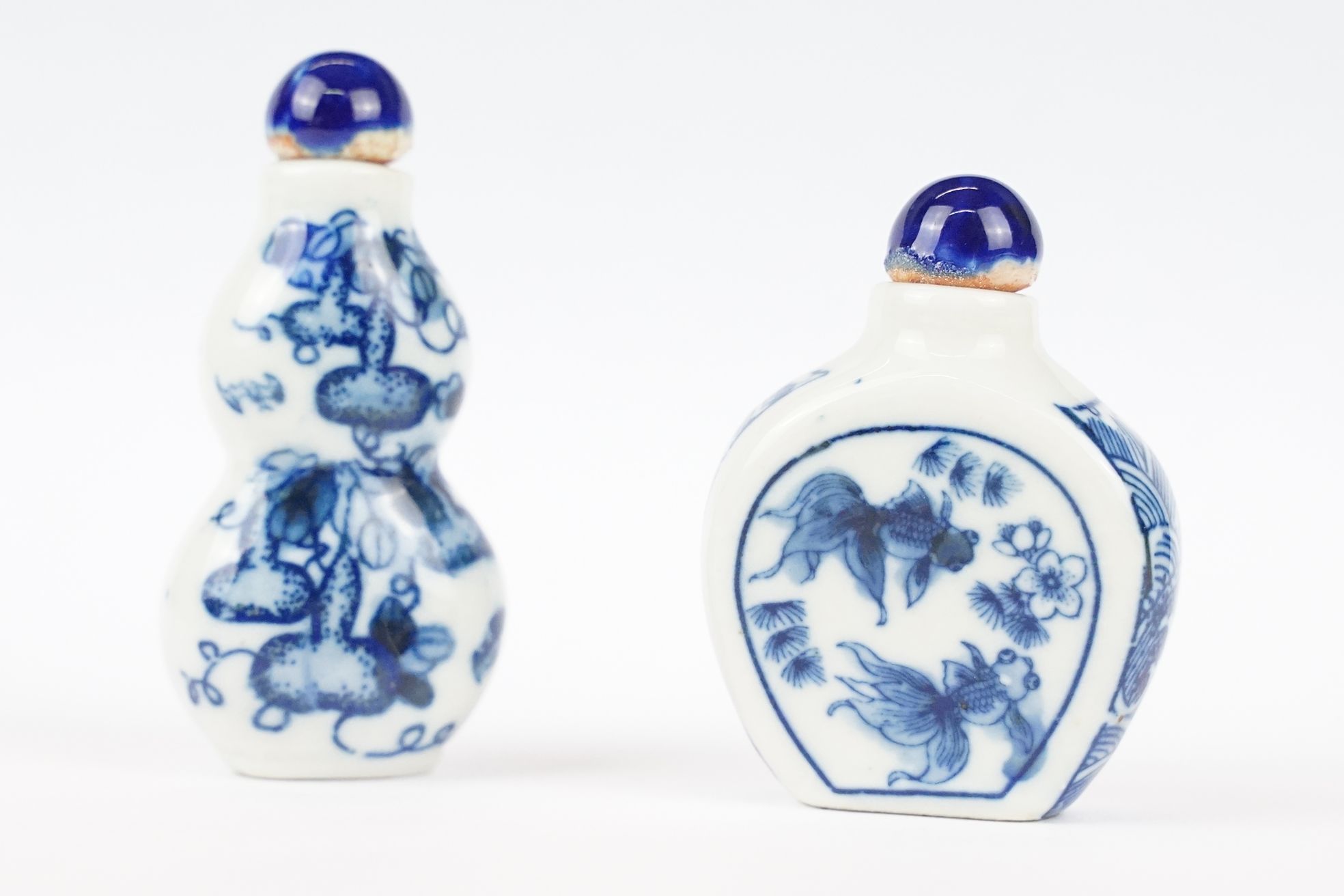 Two Chinese blue and white ceramic snuff bottles with traditional Chinese decoration. - Image 2 of 8