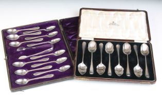 A cased set of scottish hallmarked sterling silver spoons together with a cased set of silver plated