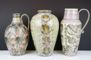 Three Denby stoneware jugs / vases with foliate & mottled decoration, one signed 'Glyn Colledge'