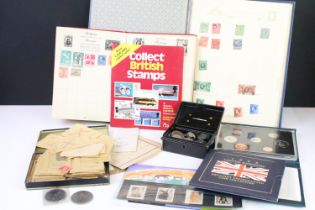 A small collection of mixed stamps together with a selection of coins and cigarette cards.