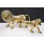 A large Brass decorative ornamental lion together with a tiger.