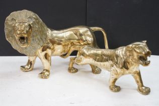 A large Brass decorative ornamental lion together with a tiger.