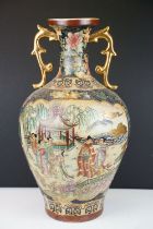 Early 20th century Japanese Satsuma vase with applied handles, decorated with figures in a