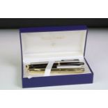 A cased Waterman fountain pen with 18ct gold nib together with three other examples to include