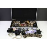 A collection of mainly contemporary mixed costume jewellery contained within an aluminium case.