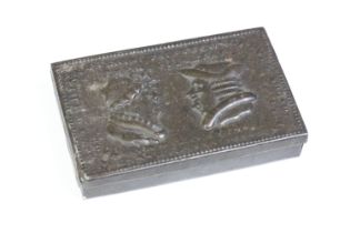 An antique Victorian tin snuff box with repousse lid titled 'The Wedding Day'