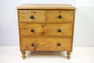 Victorian pine cottage chest of two short and two long drawers on turned legs, 83cm high x 85cm wide