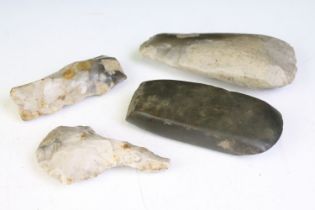 A collection of three Neolithic flint tools together with a stone age example.