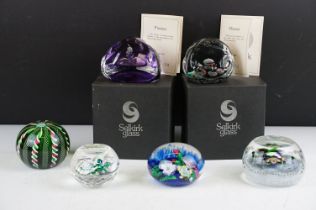 Six glass paperweights to include a John Deacons faceted lamp work pansy & millefiori paperweight (