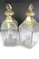 Late 19th / early 20th century pair of brass framed glass oil lamp lanterns, the glass panels with