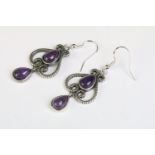 A pair of 925 sterling silver ladies drop earrings, art nouveau in style and each set with two