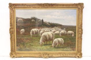 Pierced gilt framed oil painting of a shepherd with flock of sheep on a rocky headland, 50 x 70cm,