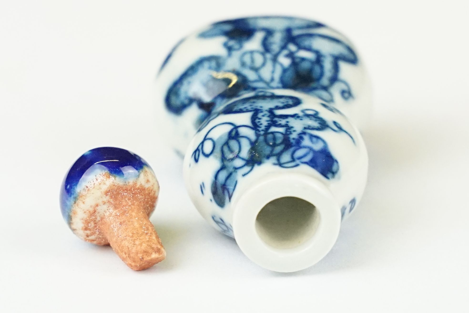 Two Chinese blue and white ceramic snuff bottles with traditional Chinese decoration. - Image 5 of 8