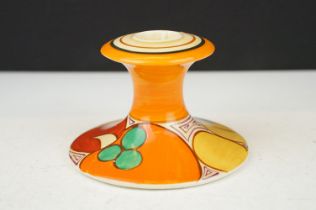 Clarice Cliff for Newport Pottery - A Fantasque Bizarre range candlestick raised on a circular foot,