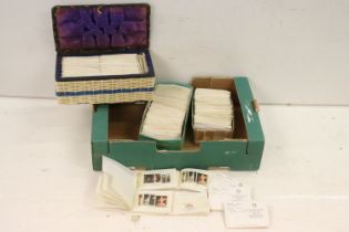 Quantity of assorted used world stamps in Atlas stamp approvals stamp books. Most dating from the
