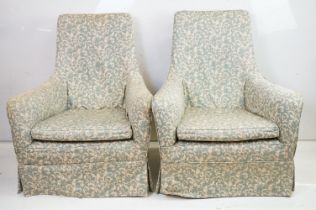 Early 20th century pair of low armchairs, on square tapering legs and casters, 89cm high x 76cm wide