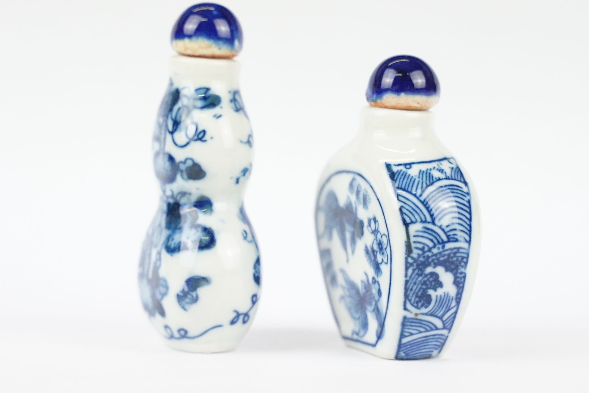 Two Chinese blue and white ceramic snuff bottles with traditional Chinese decoration. - Image 3 of 8