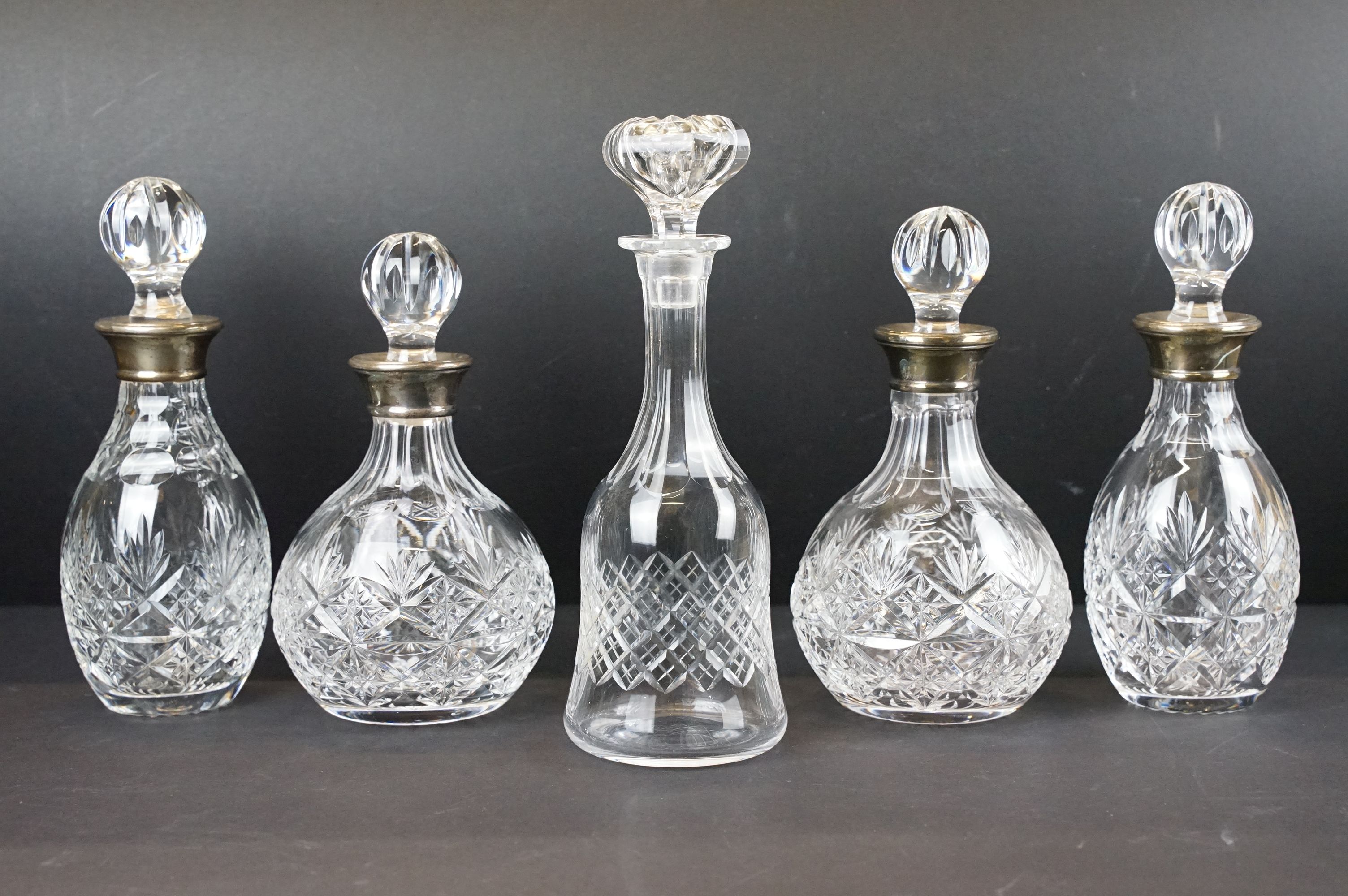 Two pairs of late 20th century cut glass decanters with silver hallmarked collars, circa 1990's (