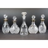 Two pairs of late 20th century cut glass decanters with silver hallmarked collars, circa 1990's (